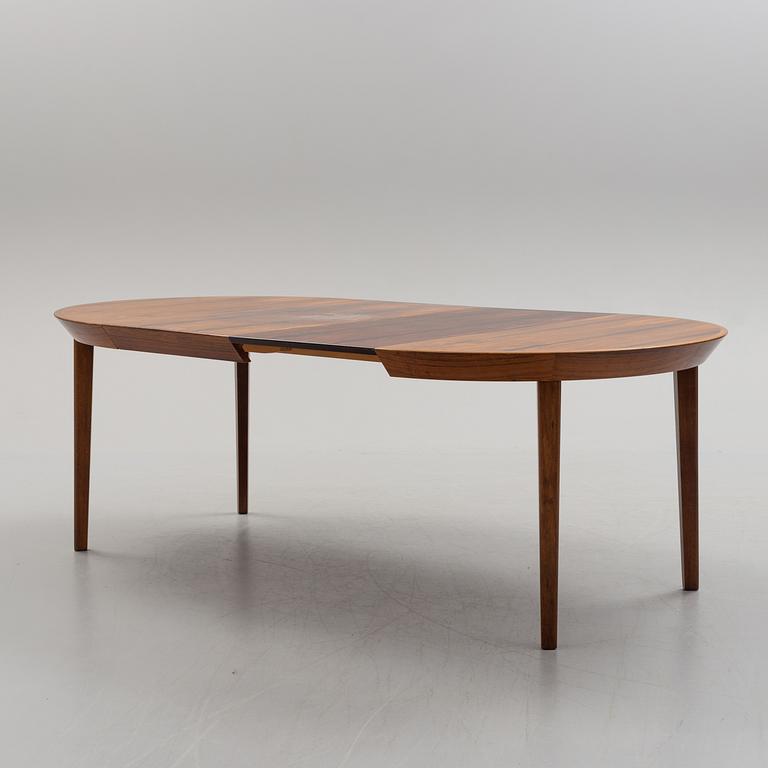 A 1950s/1960s rosewood veneer table.