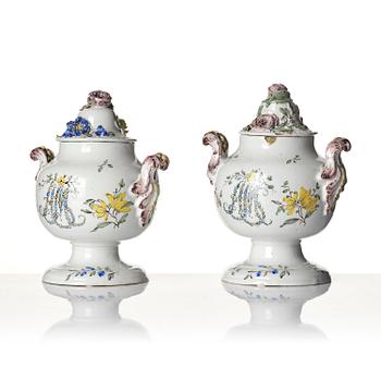 A pair of fainece potpurri jars with covers, Northern Europe, 18th century.