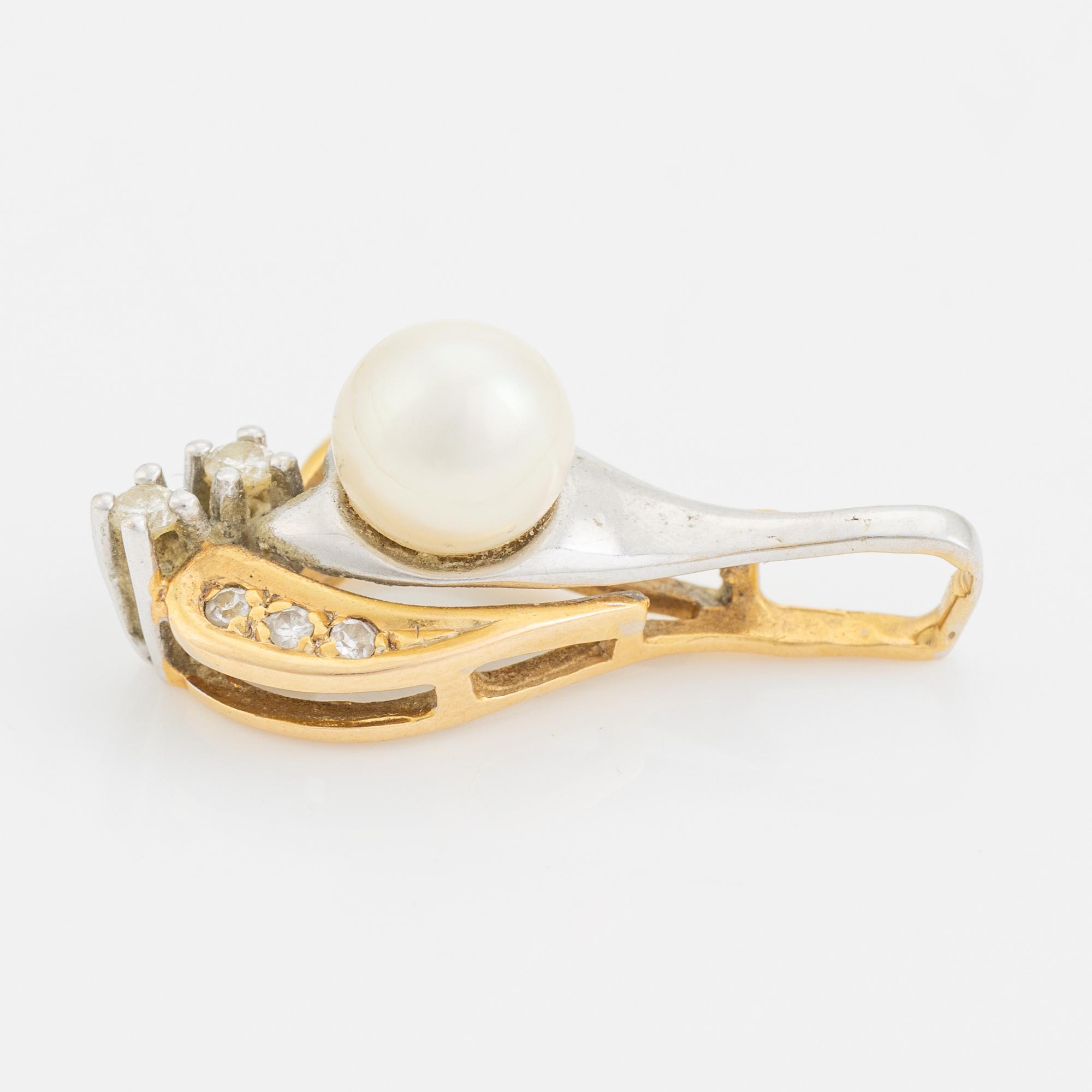 18K gold, cultured pearl and diamond pendant.