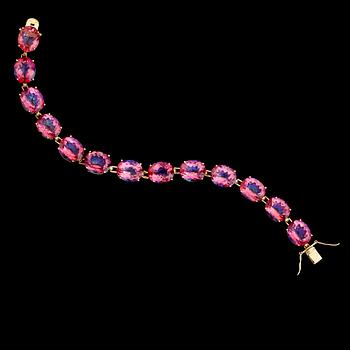 ARMBAND, förgyllt sterlingsilver, rosa behandlade topaser. Vikt ca 24,7 g.
