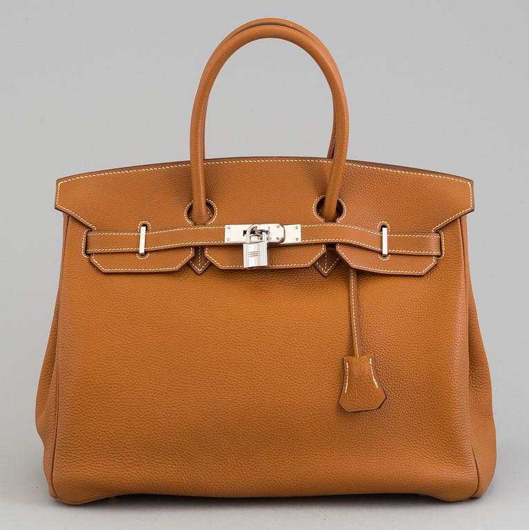 A gold togo Birkin 35 handbag by Hermès from 2004.