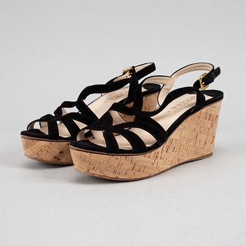 Prada, a pair of black suede wedge sandals, size 39½.