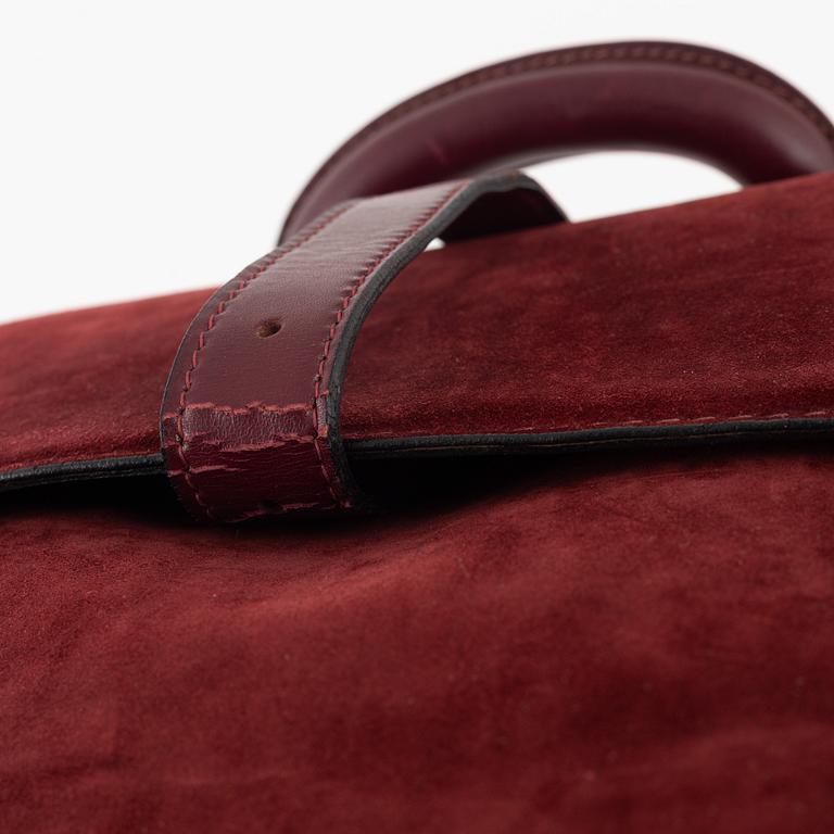 Cartier, A red suede vintage weekendbag.