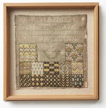 SAMPLER, embroidered, 33 x 32 cm, with the frame 44 x 43 cm, signed and dated MCF IBM 1775.