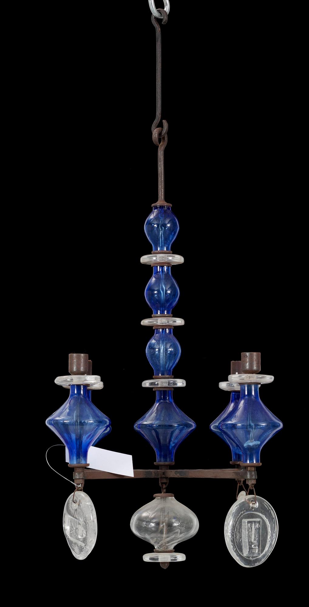LJUSKRONA, glas, järnsmide, Erik Höglund. H 58.