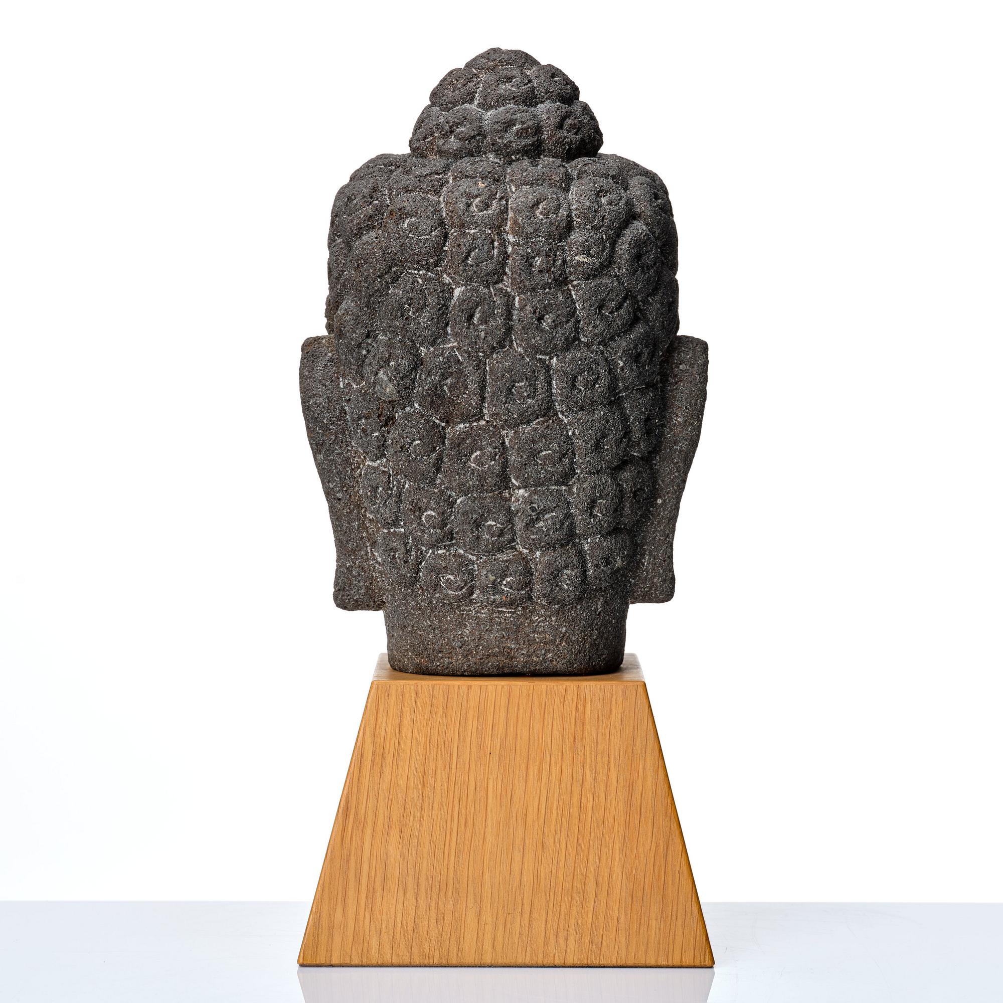 A Borobodur style Head of Buddha, Java.