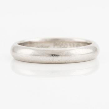 A Cartier platinum ring.