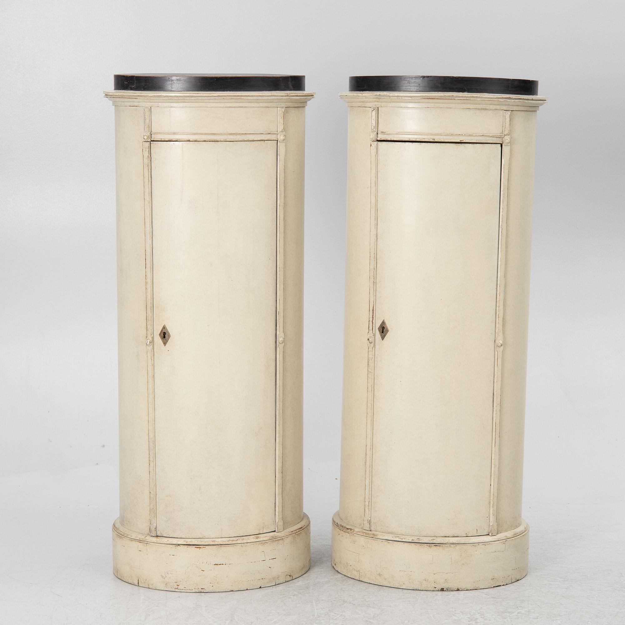 A pair of column cabinets, 19th century.
