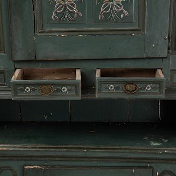 A painted cabinet from Hälsingland, possibly from the first half of the 19th century.