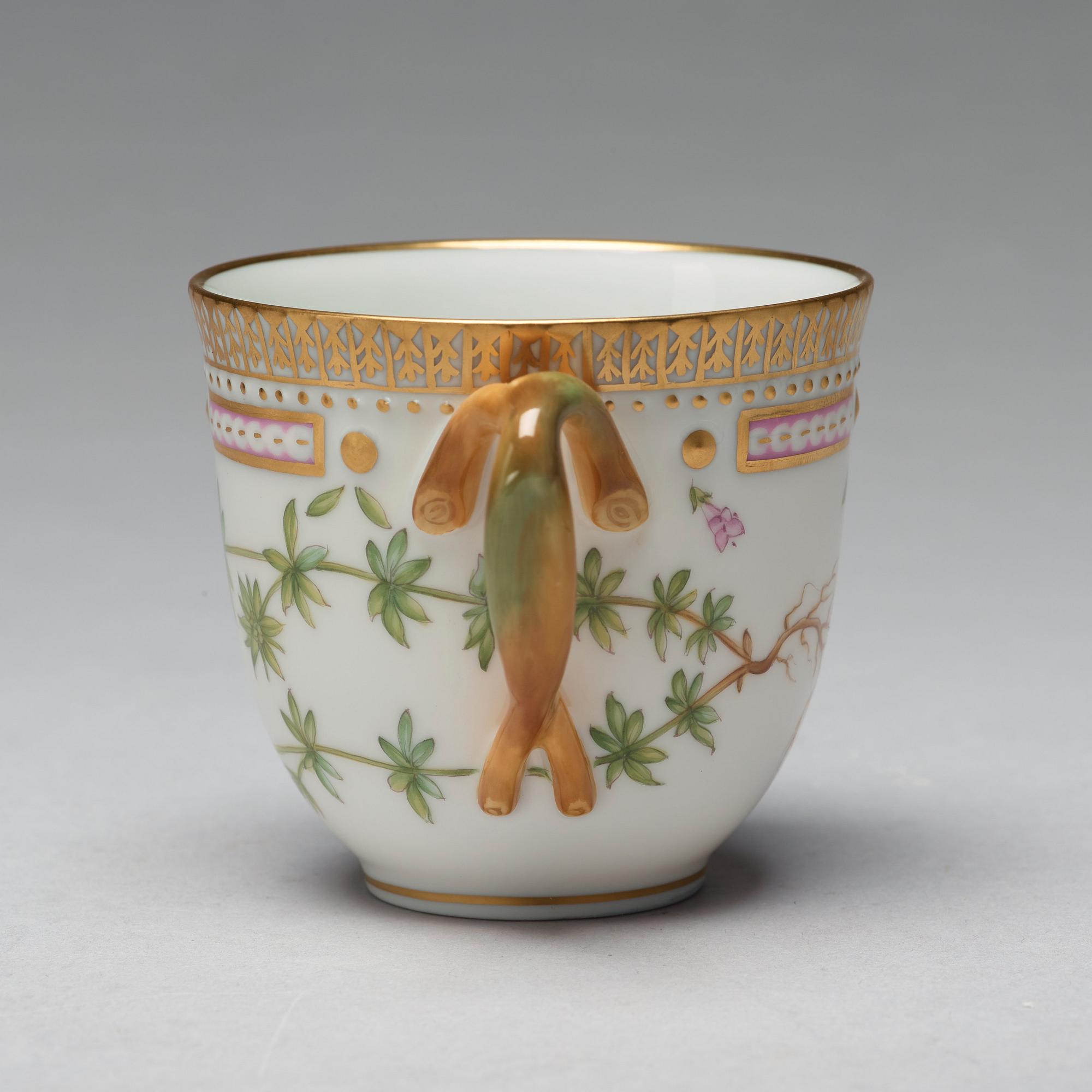 A set of four Royal Copenhagen 'Flora Danica' coffee cups with saucers, Denmark, 20th Century.