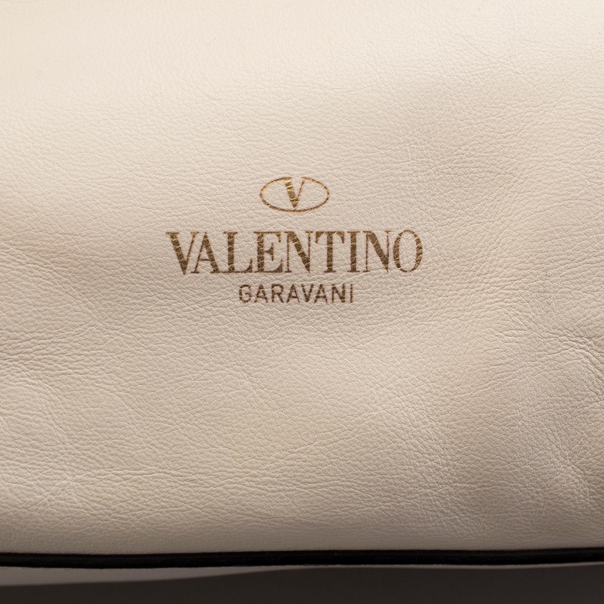 Bag by Valentino.