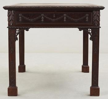 An English 18th century mahogany library table in the manner of Thomas Chippendale.