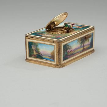 A Swiss early 20th century gilt metal and enamel music-box.