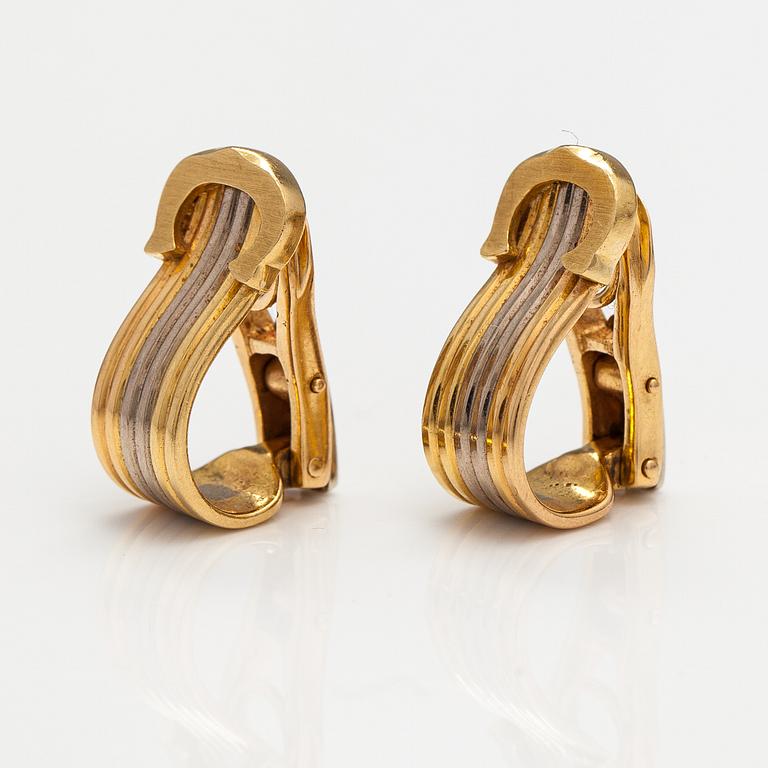 Cartier, " pair of "Ressort CC" earrings made of 18K yellow, red and white gold. Marked Cartier, 976107.