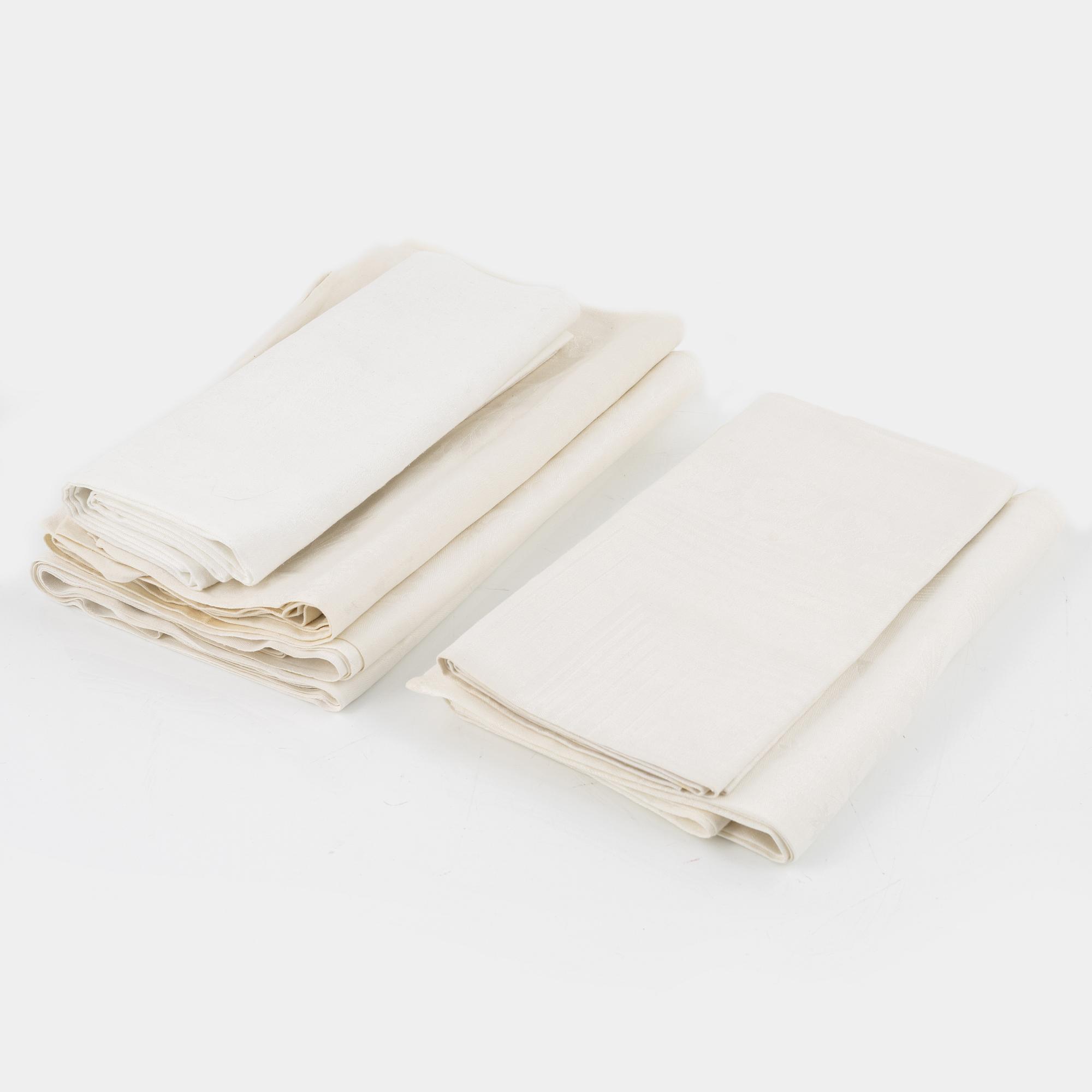 Five tablecloths, partly linen.