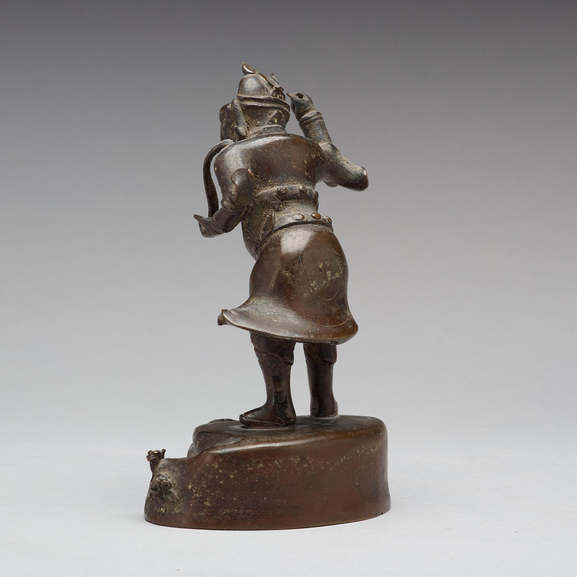 A bronze figure of a deity, Qing dynasty, 17/18th Century.