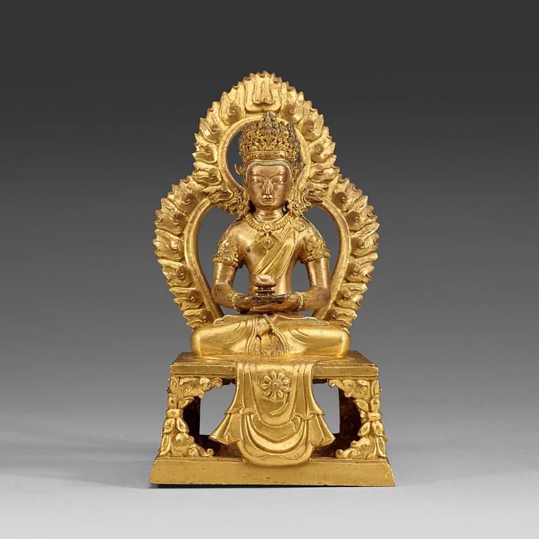 A gilt bronze figure of Amitayus, Qing dynasty, Qianlong (1736-95).