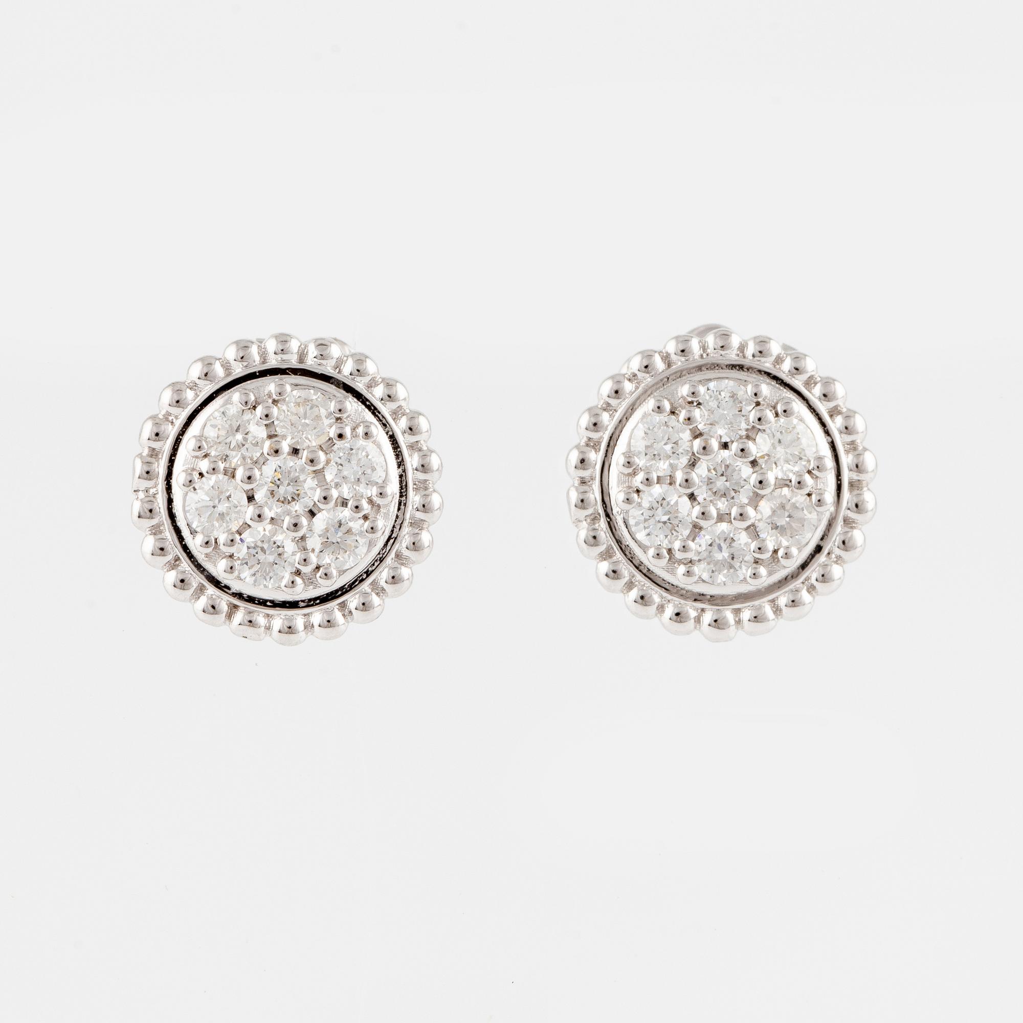Earrings with brilliant-cut diamonds.