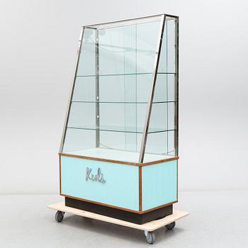 A second half of the 20th Century display cabinet for a shop.