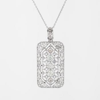 COLLIER/BROSCH, med rosen- och gammalslipade diamanter.