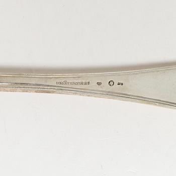Three Swedish silver serving spoons, Stockholm, marks of G Möllenborg 1824 and G Folcker 1828-1834.
