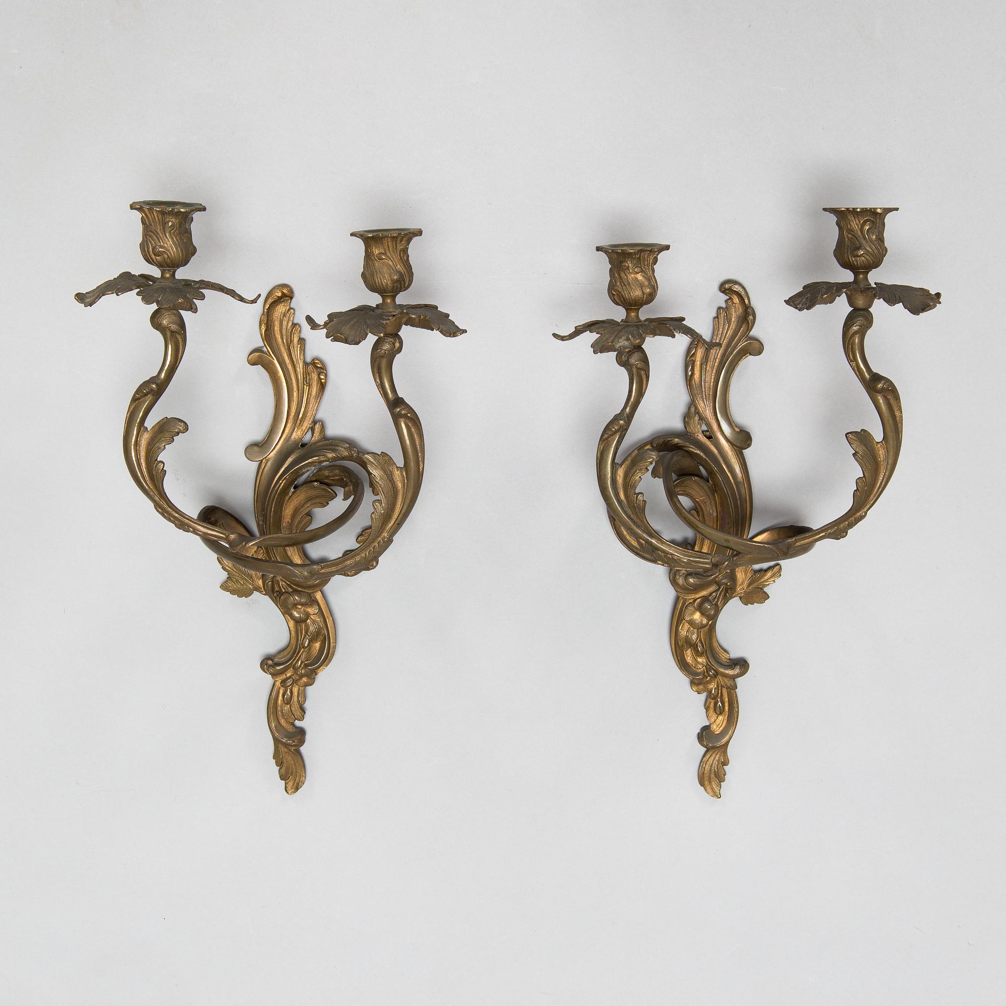 A pair of wall sconces, circa 1900.