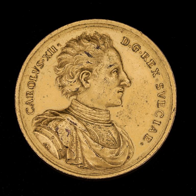 A gilded medal in memory of the battle at Fraustadt 1706 with the portrait of the Swedish King, Karl XII.