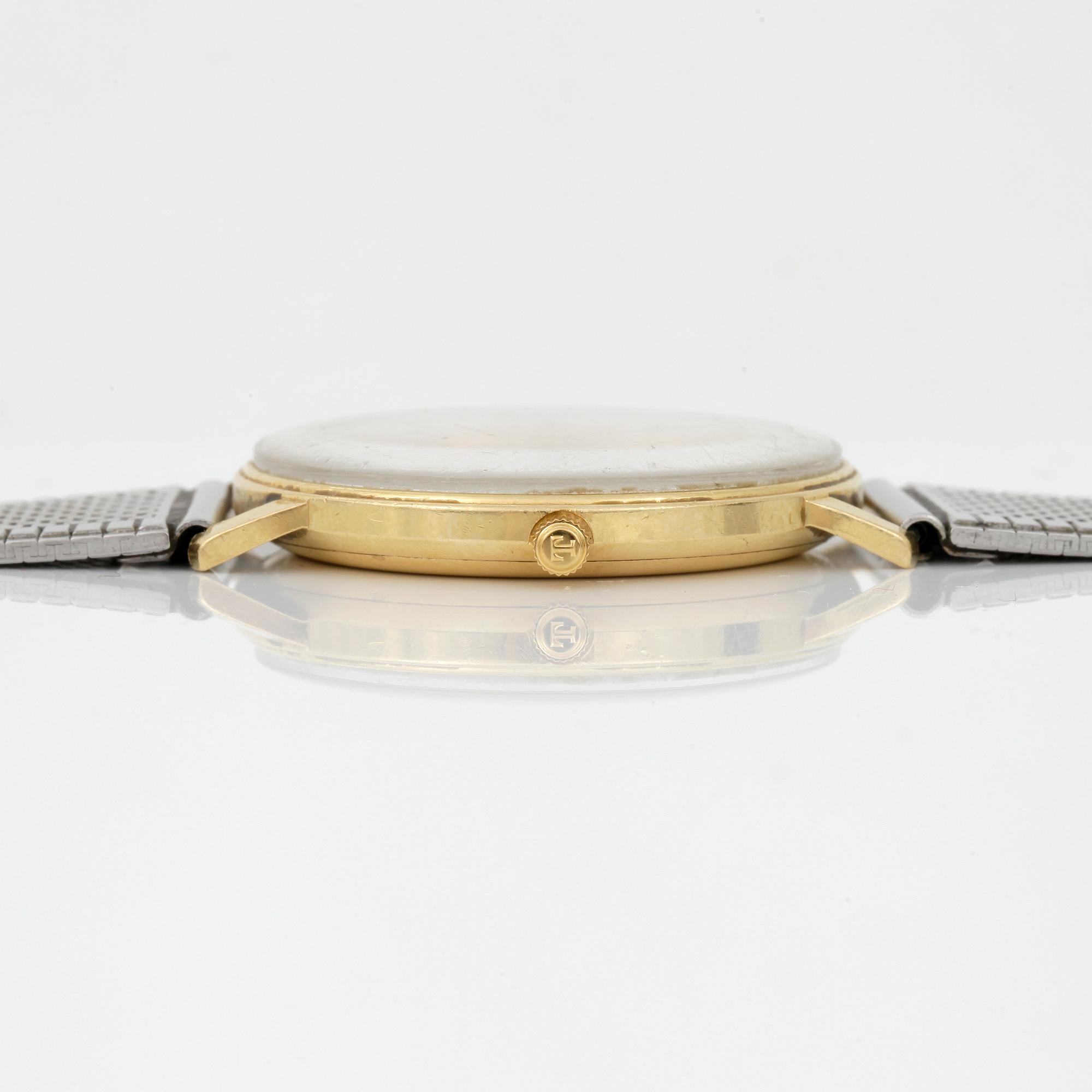 ARMBANDSUR, 18 k guld, Tissot Seastar.