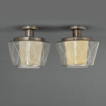 Harald Notini, taklampor, ett par, modell "11197", Arvid Böhlmarks Lampfabrik, Stockholm, 1940-50-tal.