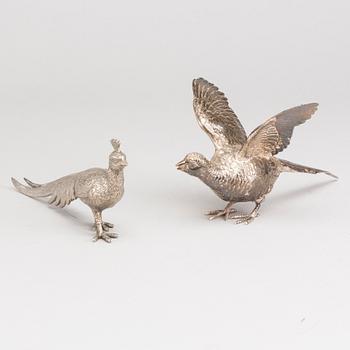 A set of two table figurines, one silver, D.J. Wellby Ltd London, 20th century.