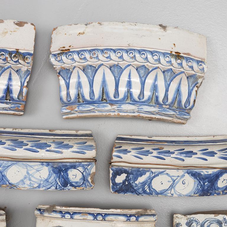 Eleven glazed earthenware tiles, 18th century.