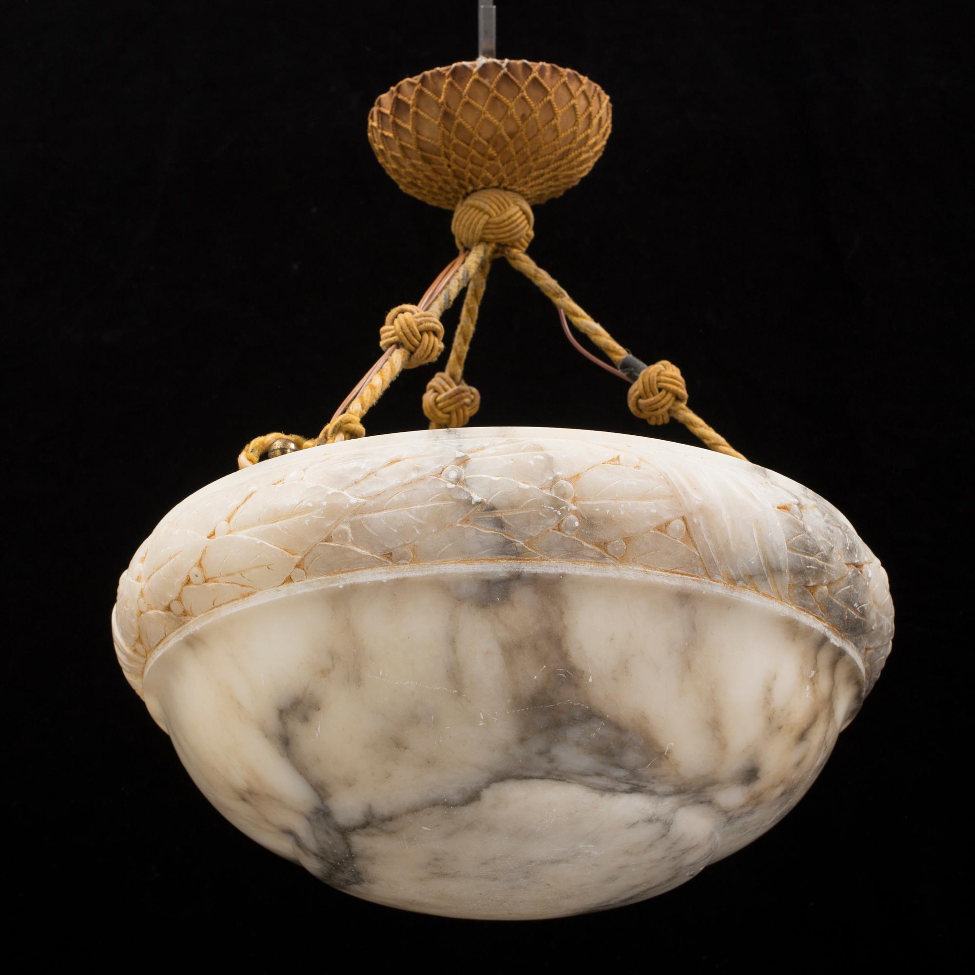 An early 20th century alabaster ceiling lamp.