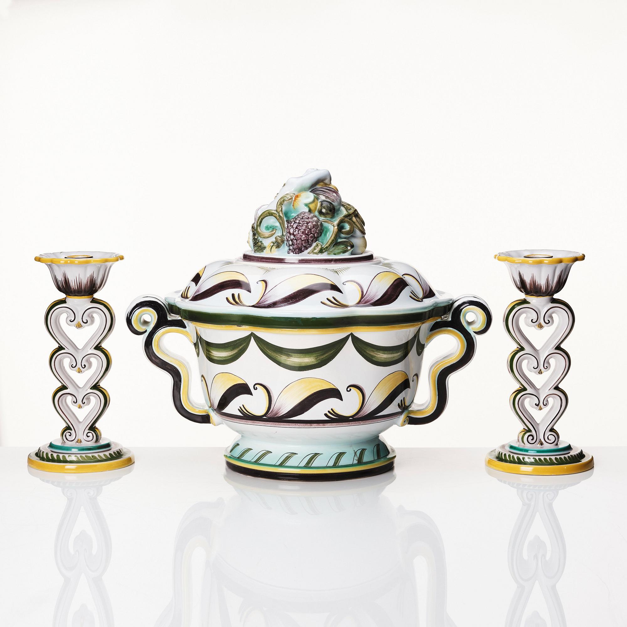 Arthur Percy, a Swedish Grace  lidded faience bowl and a pair of candlesticks,  Gefle Porslinsfabrik 1920s-1930s.