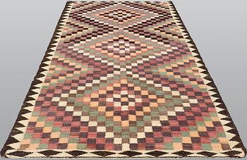 A carpet, Persian nomad Kilim, ca 290 x 150 cm.