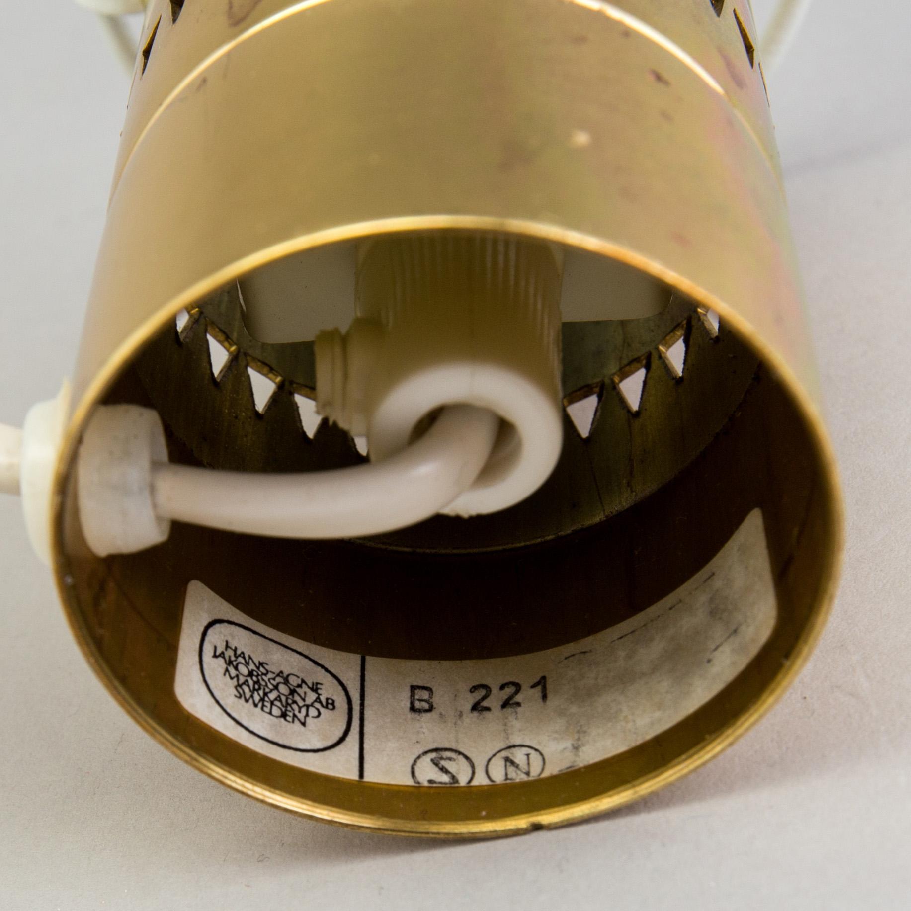 HANS AGNE JAKOBSSON, a ceiling lamp and a table lamp, brass, Markaryd, second half of the 20th century.