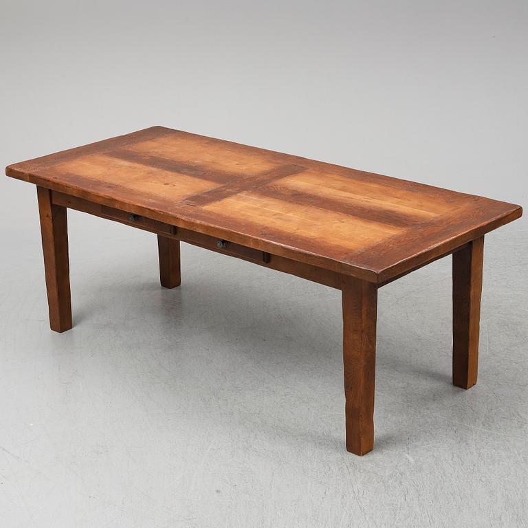 A French country style oak dining table, 1900/2000.