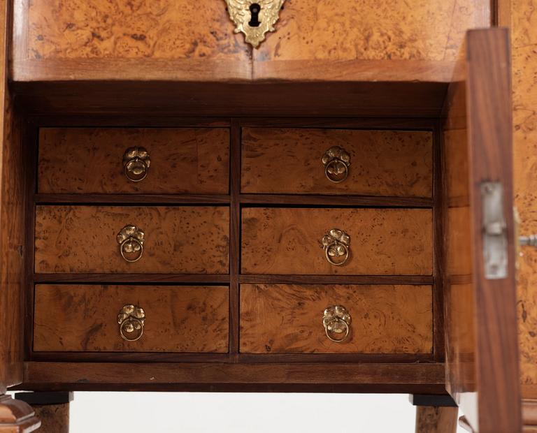 A Swedish late Baroque 18th century writing desk with fall front.