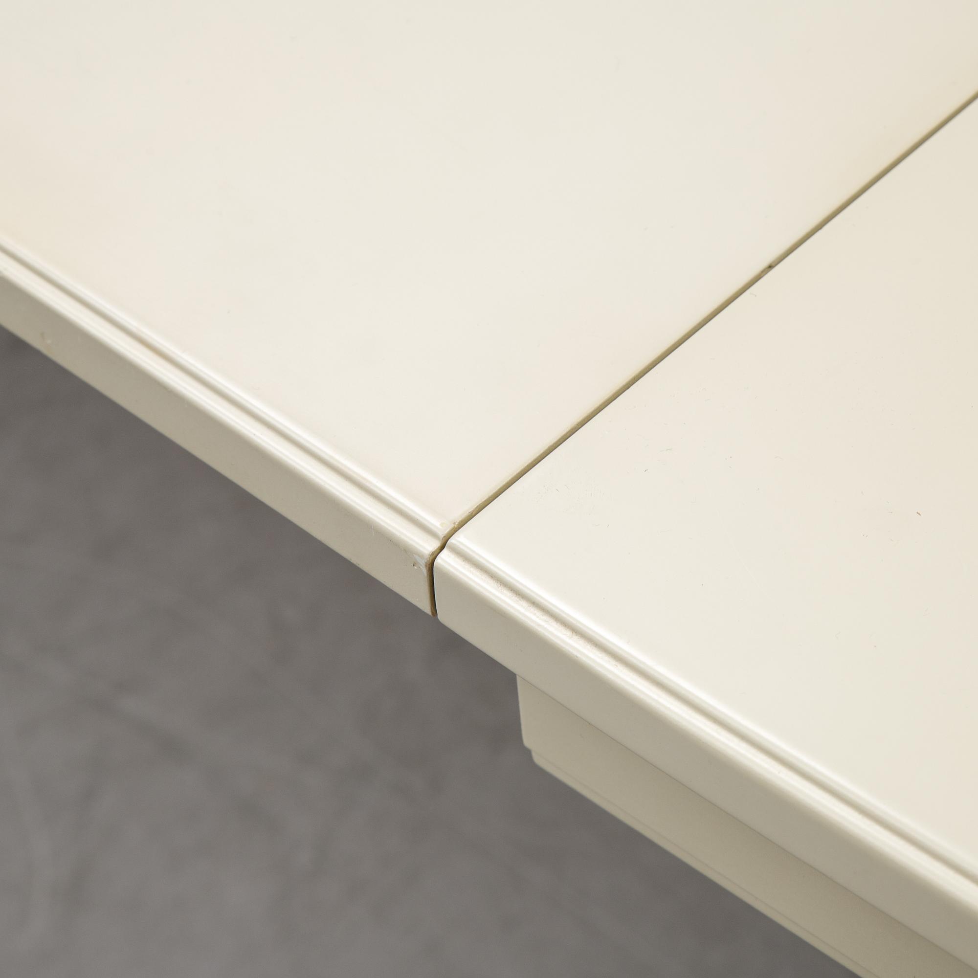 A dining table with six chairs by Carl Malmsten, second half of the 20th Century.