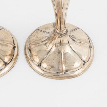 A pair of silver candlesticks, early 20th Century.