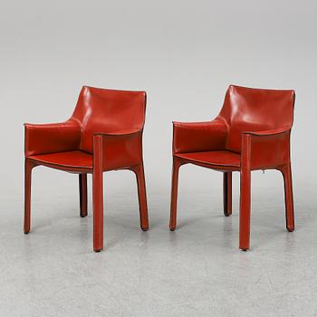 A pair of leather upholstered model 413 CAB armchairs by Mario Bellini for Cassina.