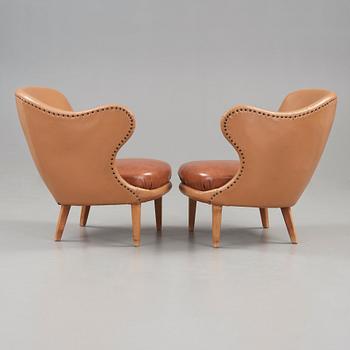 Arne Norell, A pair of Arne Norell 'Tummen/ The Thumb' easy chairs, Gösta Westerbergs Möbler, Stockholm 1950's.