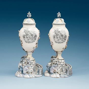 853. A pair of Swedish Marieberg faience vases with covers, 18th Century.