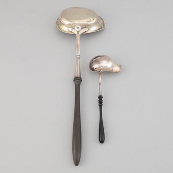 Two silver ladles, by Carl August Nilsson, Malmö, 1882, and Isak Gustaf Sundström, Söderköping, 1875.