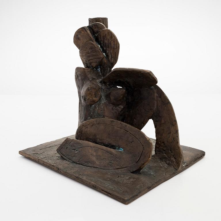 Erkki Kannosto, Sittande figur.