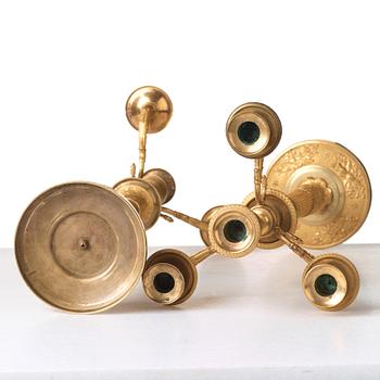 A pair of Empire early 19th century gilt bronze four-light candelabra.