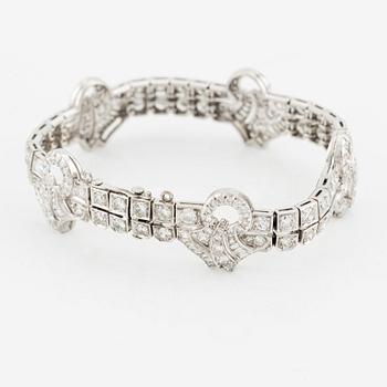 Armband platina med runda briljant, åttkant- och baguetteslipade diamanter, Gübelin.