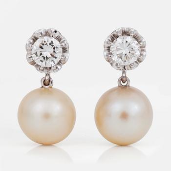 515A. A pair of cultured pearl and diamond, ca 0.90 ct/pcs, earrings.