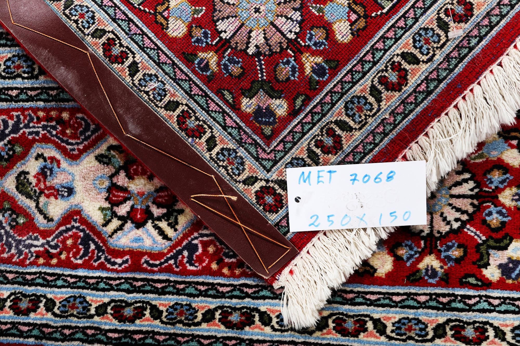 An oriental carpet, c. 250 x 150 cm.