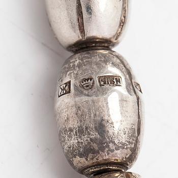 A set of silver "Halikko treasure" necklace, bracelet, ring and earrings. Kalevala Koru, Helsinki 1965-1972.