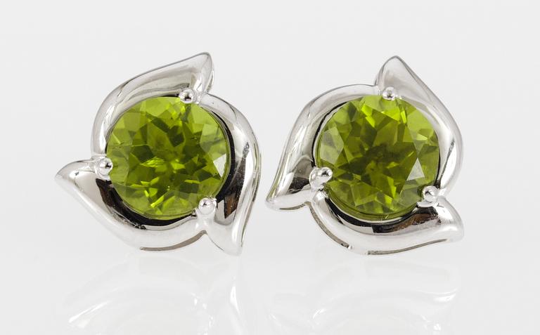EARRINGS, set with peridotes.